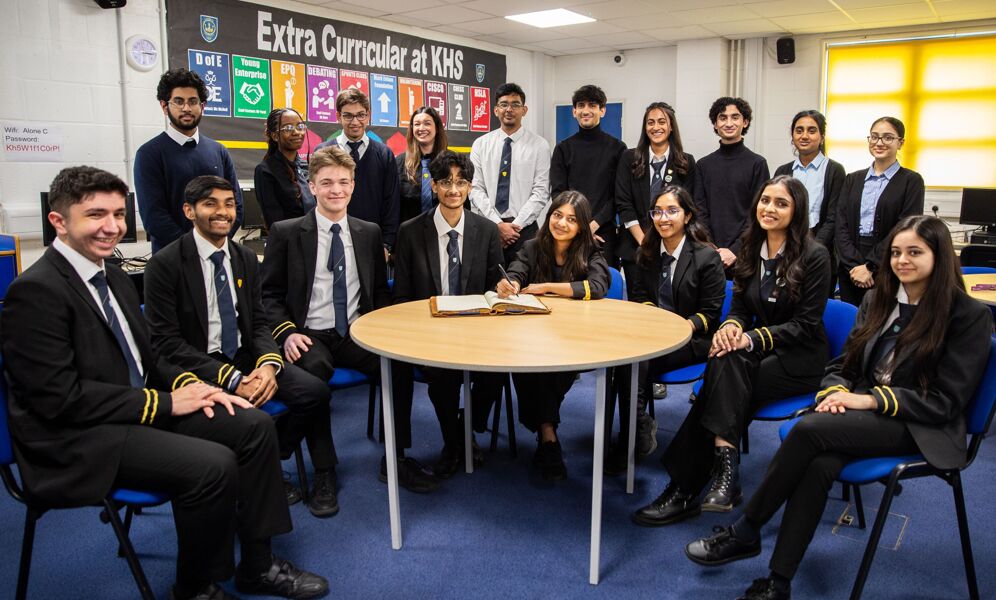 Signing the Student Prefect Book